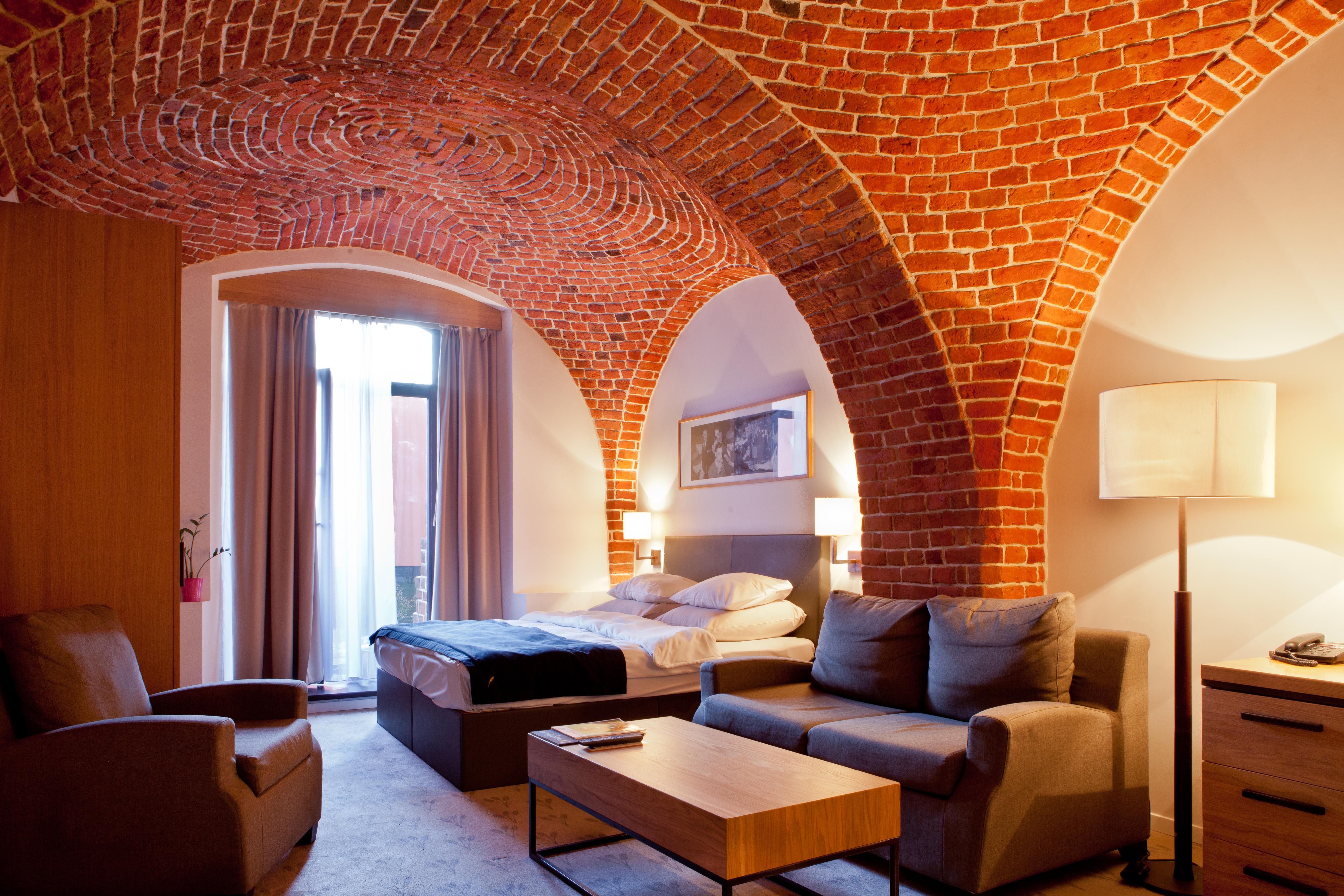 The Granary - La Suite Hotel Wrocław Buitenkant foto A room at the hotel