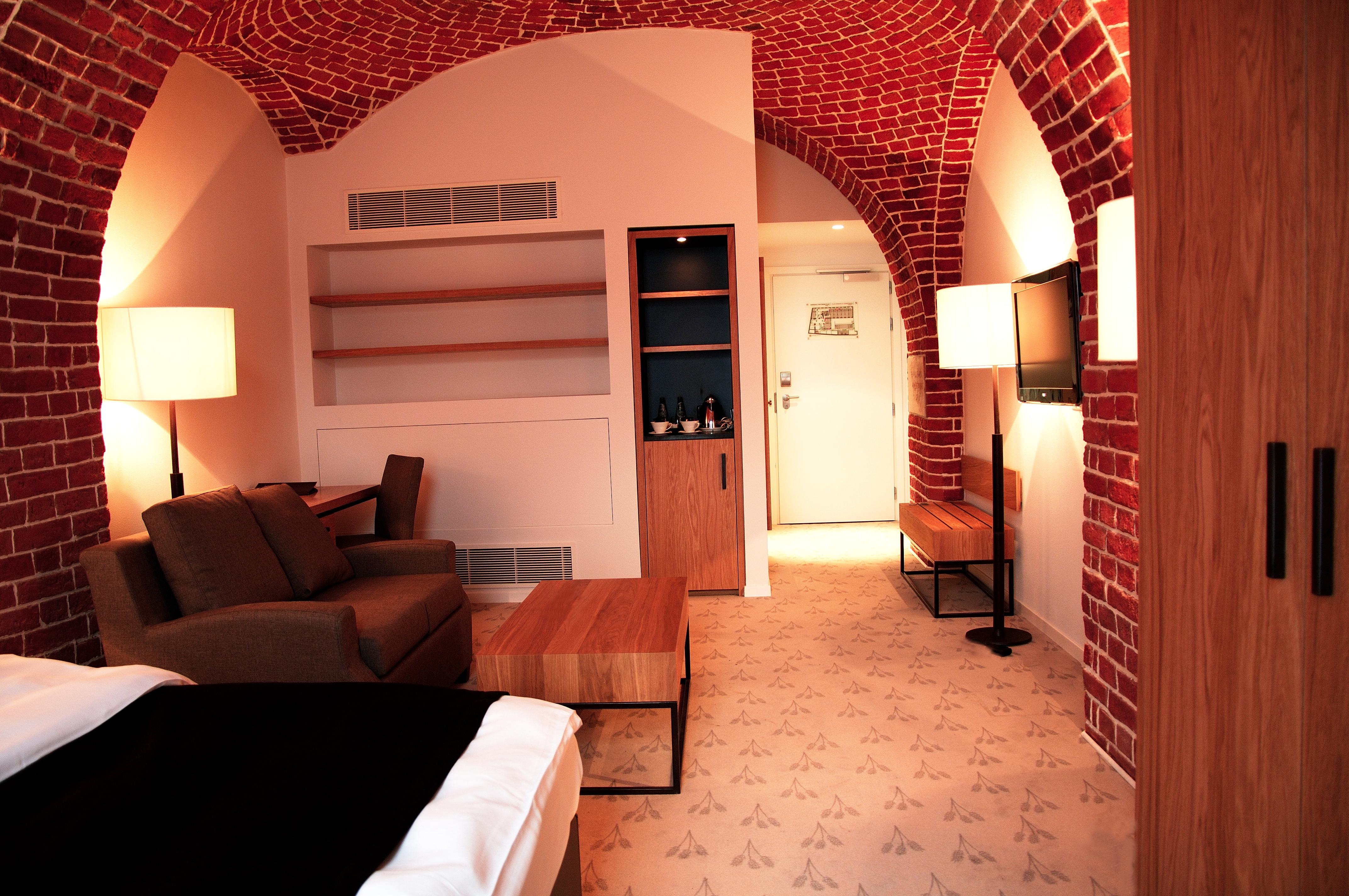 The Granary - La Suite Hotel Wrocław Buitenkant foto A room at the hotel